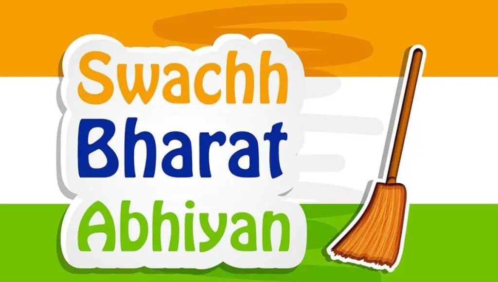 In this image there is an indian flag and one broom and written " SWACHH BHARAT ABHIYAN ". On topic - स्वच्छ भारत अभियान.